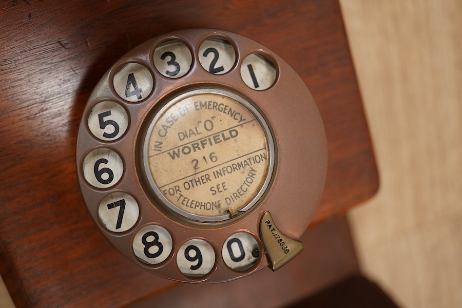 A 1920s walnut wall mounted GPO Model 121 telephone, Patent no.178938. Condition - good.